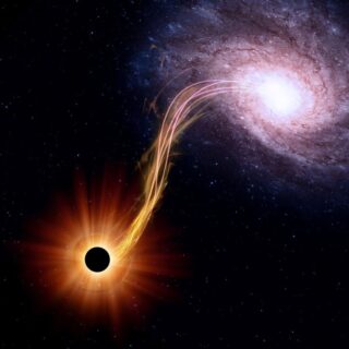مجرة في الفضاء لونها زهري فاتح تقوم بجذب كوكب أسود كبير اليها عبر شعاع اصفر يمتد من المجرة الى الكوكب الأسود