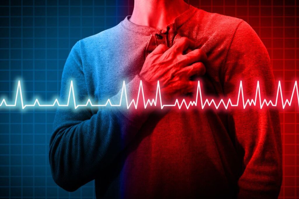 شخص بالغ يضع يده اليمنى على صدره الشمالي ويقوم بشد يده على صدره وتظهر امامه إشارة تخطيط القلب