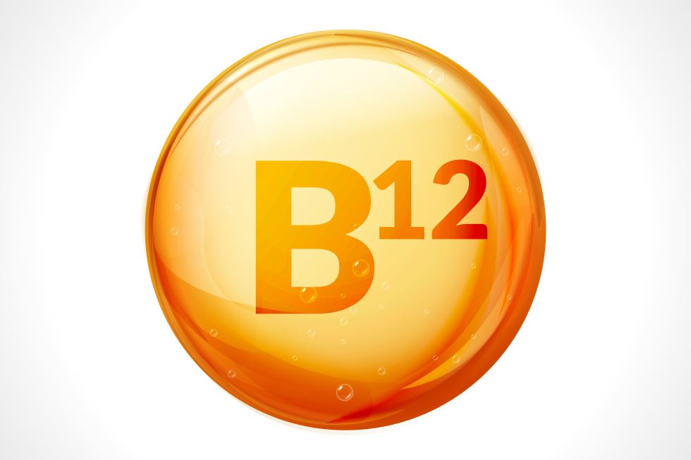 رسم توضيحي لكرة ذهبية داخلها حرف b باللغة الإنكليزية وجانبها رقم 12 تعبيرا عن فيتامين B12