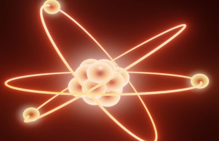 مجموعة من الكرات المضيئة وتدور حولها كرات مضيئة أصغر منها