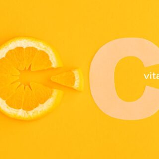 شريحة من البرتقال بجانبها حرف س مكتوب باللغة الإنكليزية