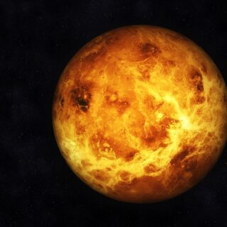 كوكب الزهرة على شكل كرة صفراء ملتهبة تطفو في الظلام