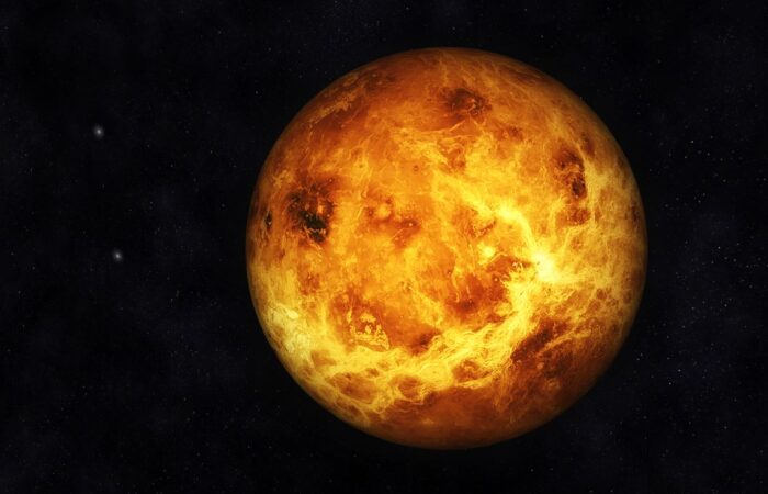 كوكب الزهرة على شكل كرة صفراء ملتهبة تطفو في الظلام