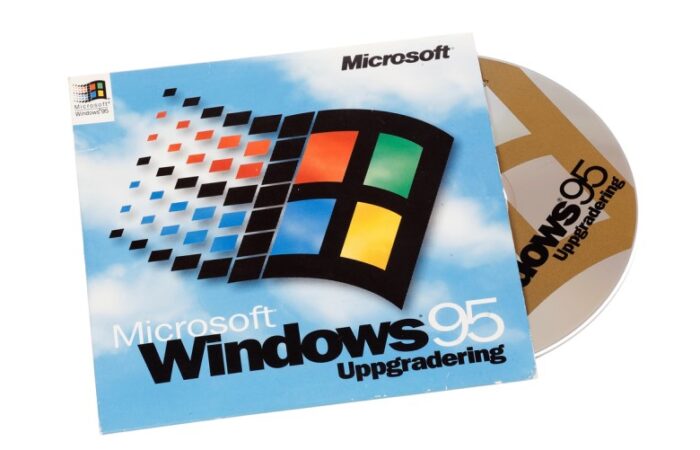 كلمة Windows 95 بالإنكليزية ومربعات ملونة بالأحمر والأصفر والأزرق والأخضر